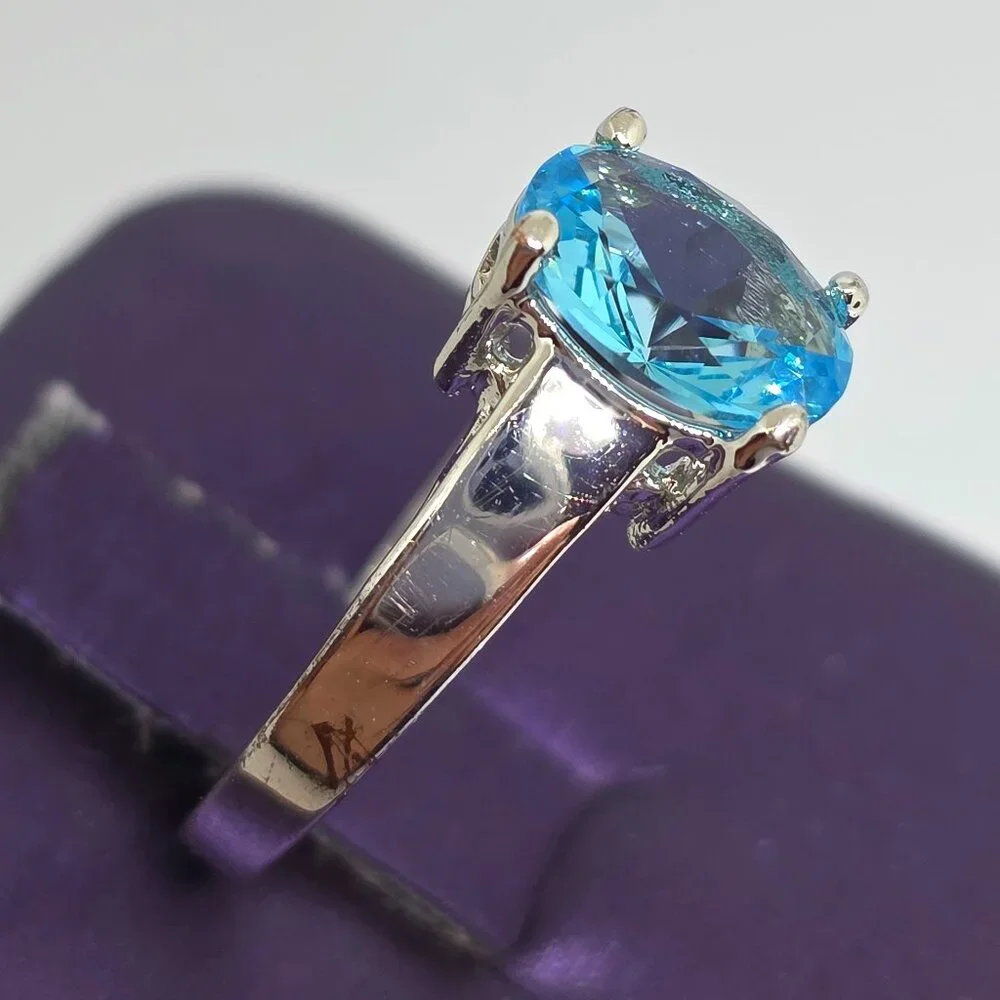 Beautiful Silver Oval Faceted Light Blue Rhodium Plated Solitaire Ring Sz 6.75